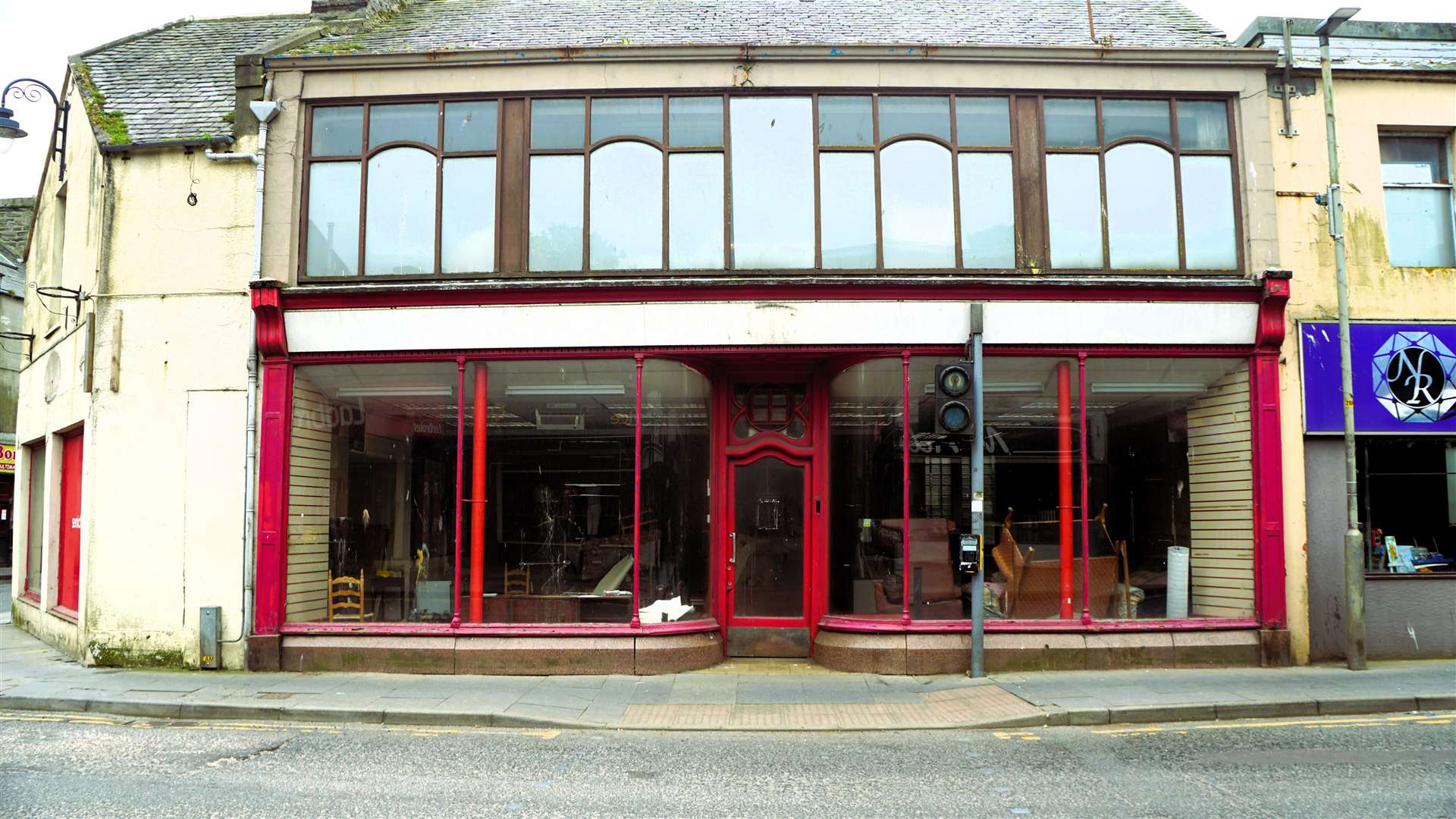 The facade of the former Semichem shop could be enhanced by window posters. Picture: DGS