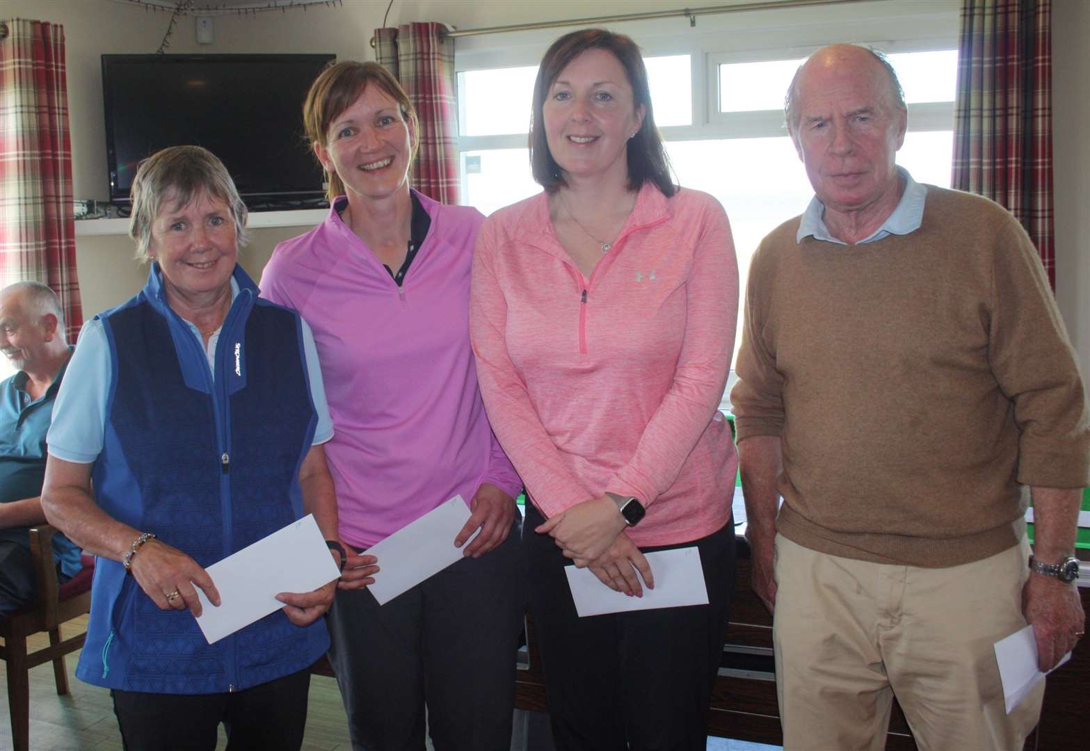 three members of the team who won the Bighouse Open Scramble on Sunday, from left to right Joy Fraser, Heather Campbell and Nicola Campbell with Toby Ward of the Bighouse Estate.