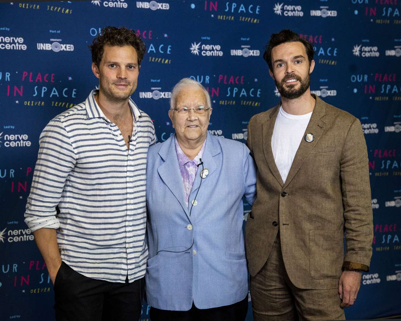 Baroness May Blood with Jamie Dornan and Oliver Jeffers at the Lyric Theatre in Belfast before a discussion of how integrated education in Northern Ireland shaped their lives (Liam McBurney/PA)