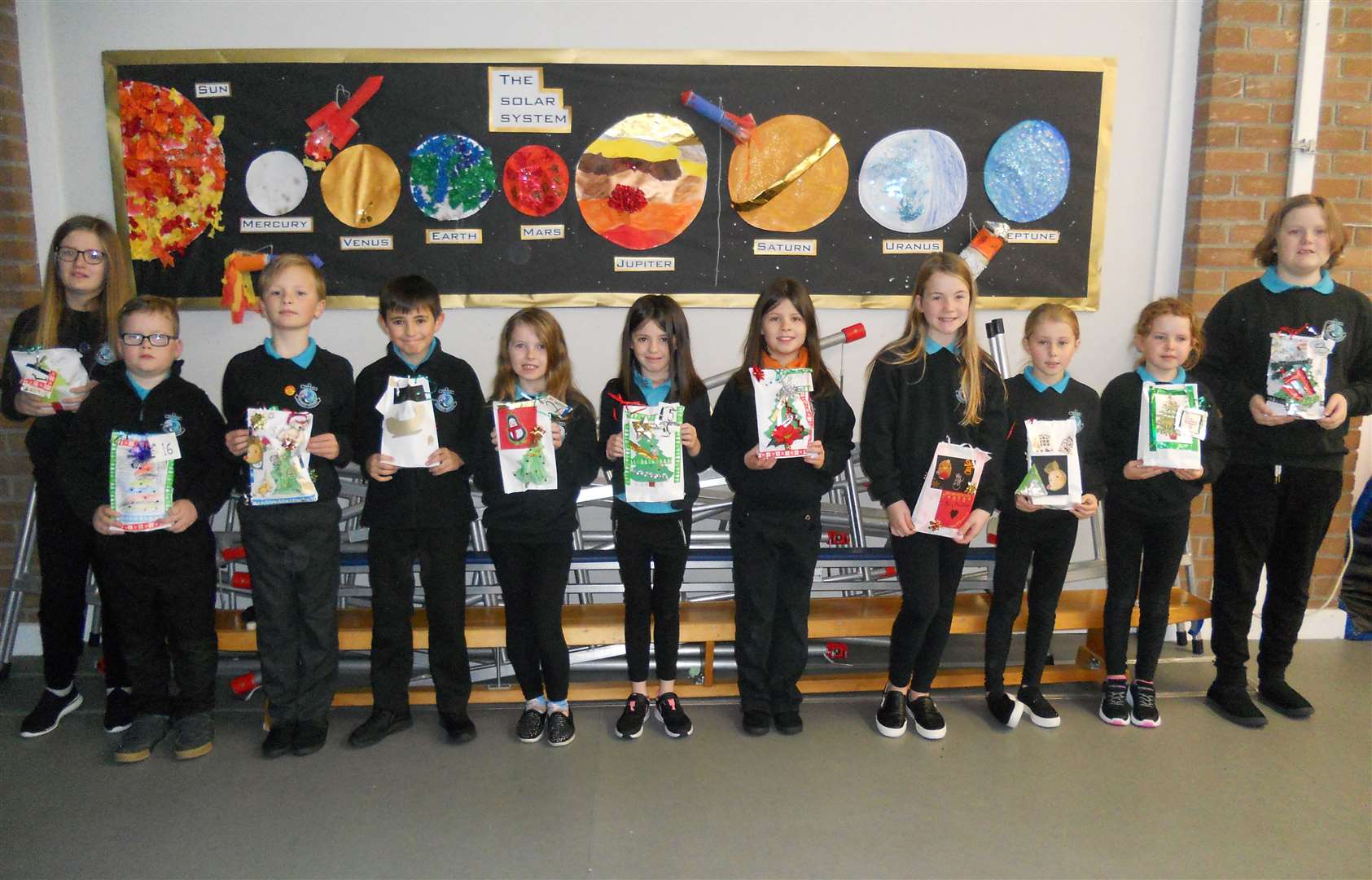Melvich P4-7 pupils with their Advent gift bags.
