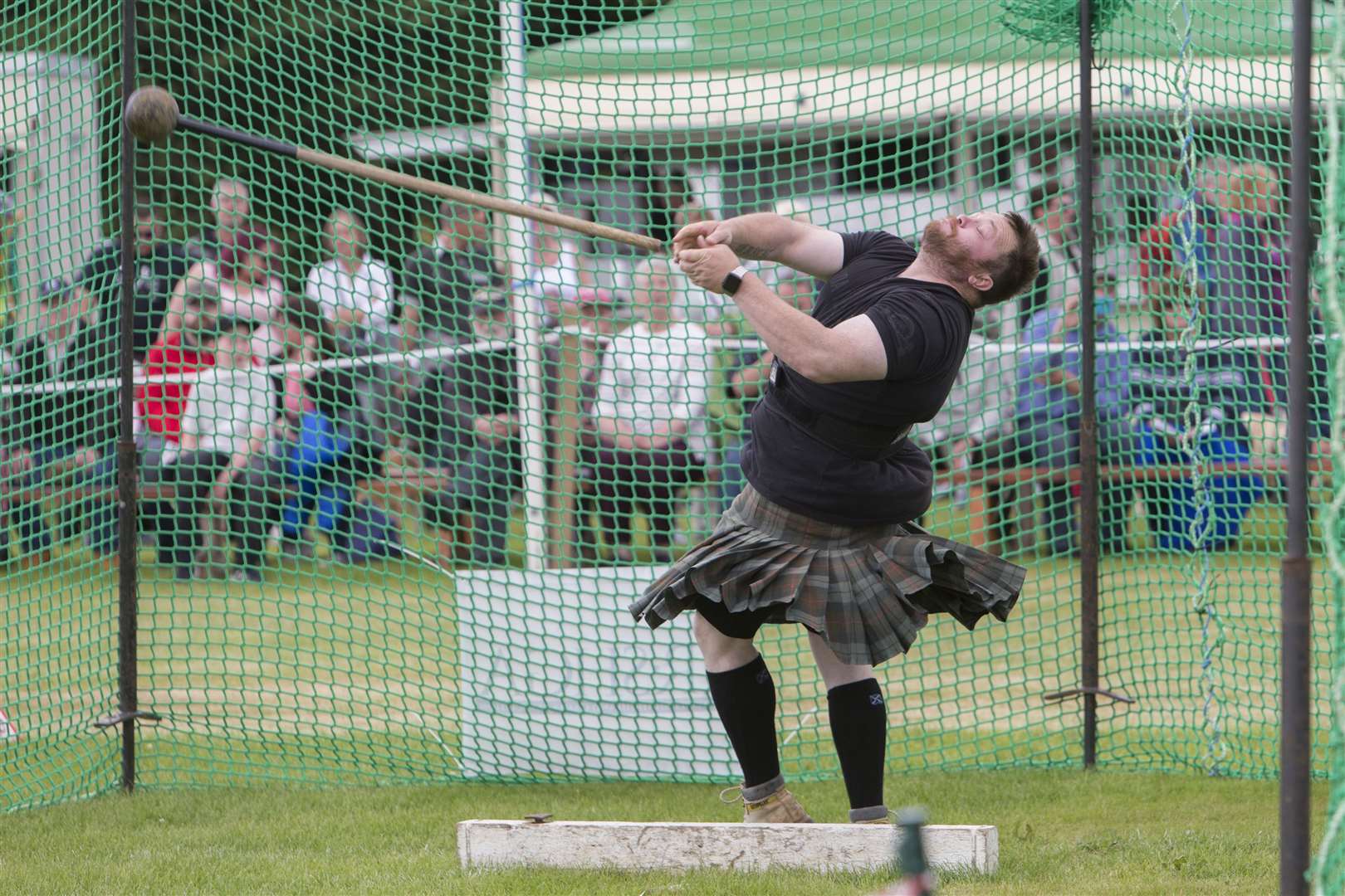 Halkirk's Jamie Gunn throwing the 16lb hammer. Picture: Robert MacDonald/Northern Studios