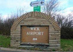 The operators of Wick Airport have requested a sign to give visitors directions to local attractions, but the fact that it would be bilingual has upset some councillors.