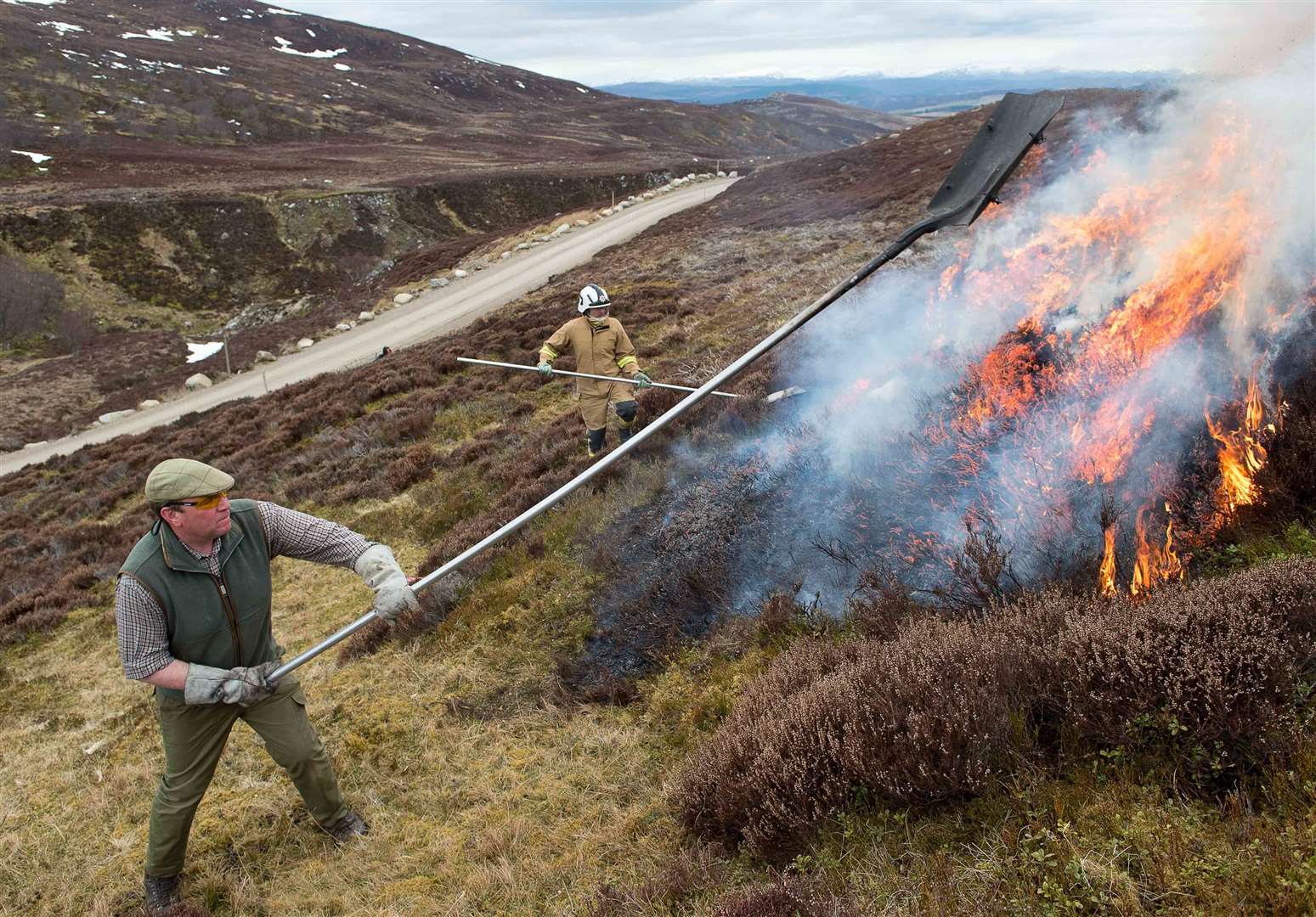 Heather-burning and back-burning training with Iain Hepburn, head gamekeeper at Dunmaglass Estate, and Alex McKinley, a wildfire tactical adviser for the Scottish Fire and Rescue Service. Picture: Trevor Martin
