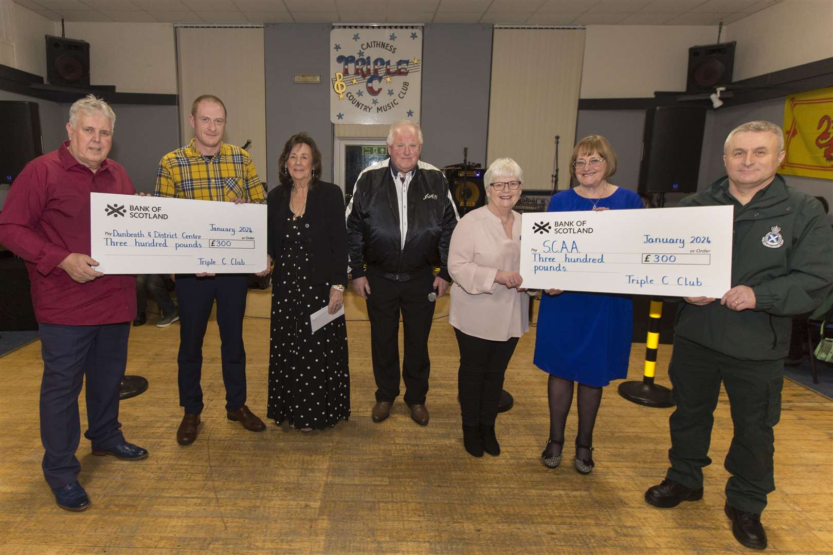 Triple C members and recipients with cheques handed over at the country music club's recent meeting. Picture: Robert MacDonald/Northern Studios