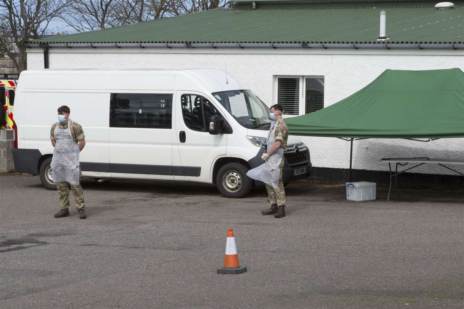 Army personnel at the Covid-19 mobile testing centre in Thurso's Millbank Road on Wednesday. Picture: Robert MacDonald / Northern Studios