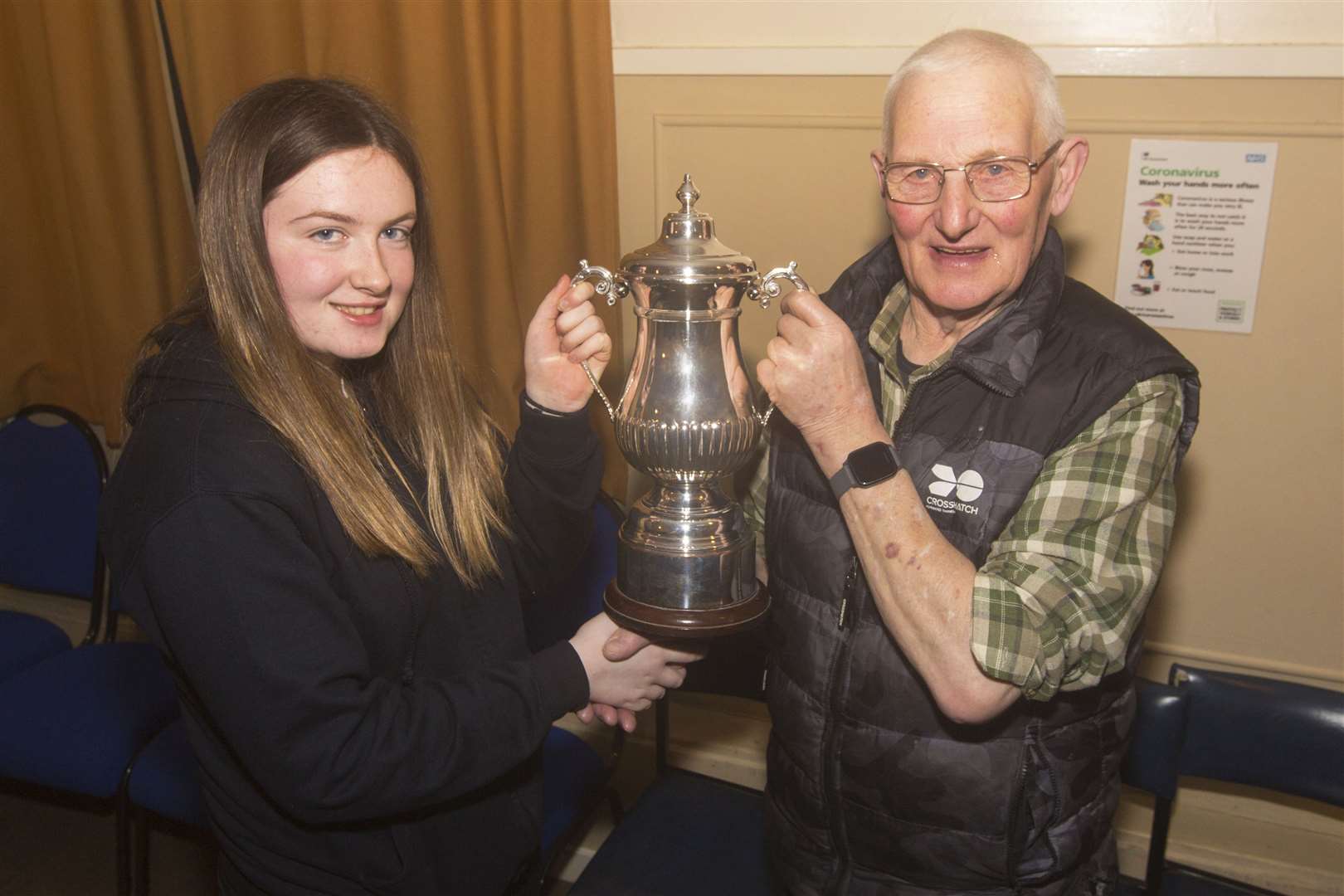 Halkirk Rifle Club junior member Sophie Campbell won Caithness Small Bore Rifle Association's Daisy 2000 indoor championship for the second successive year. She received the trophy from Jim Manson of Westfield Rifle Club. The competition, open to juniors up to the age of 18, was held in Lieurary hall. Picture: Robert MacDonald / Northern Studios