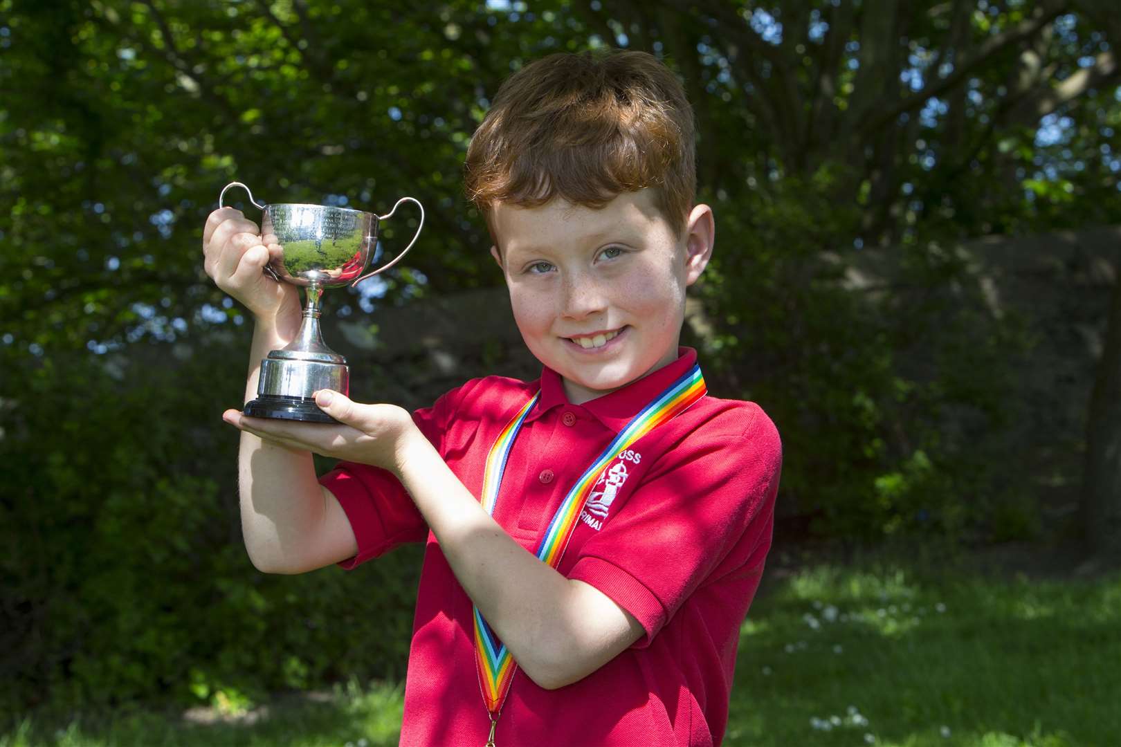 Archie Tait with the Pentland Cup for boys' P4 verse speaking. Picture: Robert MacDonald / Northern Studios