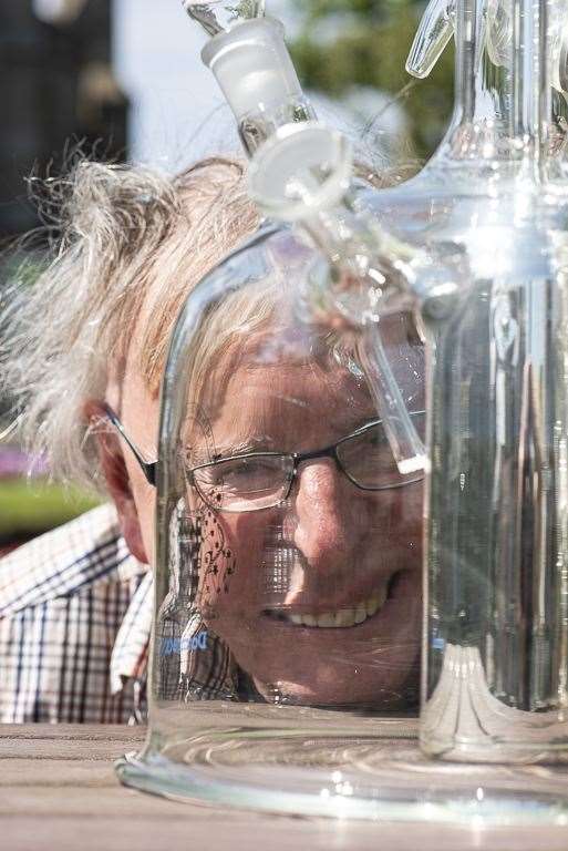 Ian Pearson with a piece of his technical glassware in Sir John's Square, Thurso. Picture: Mark Griffin