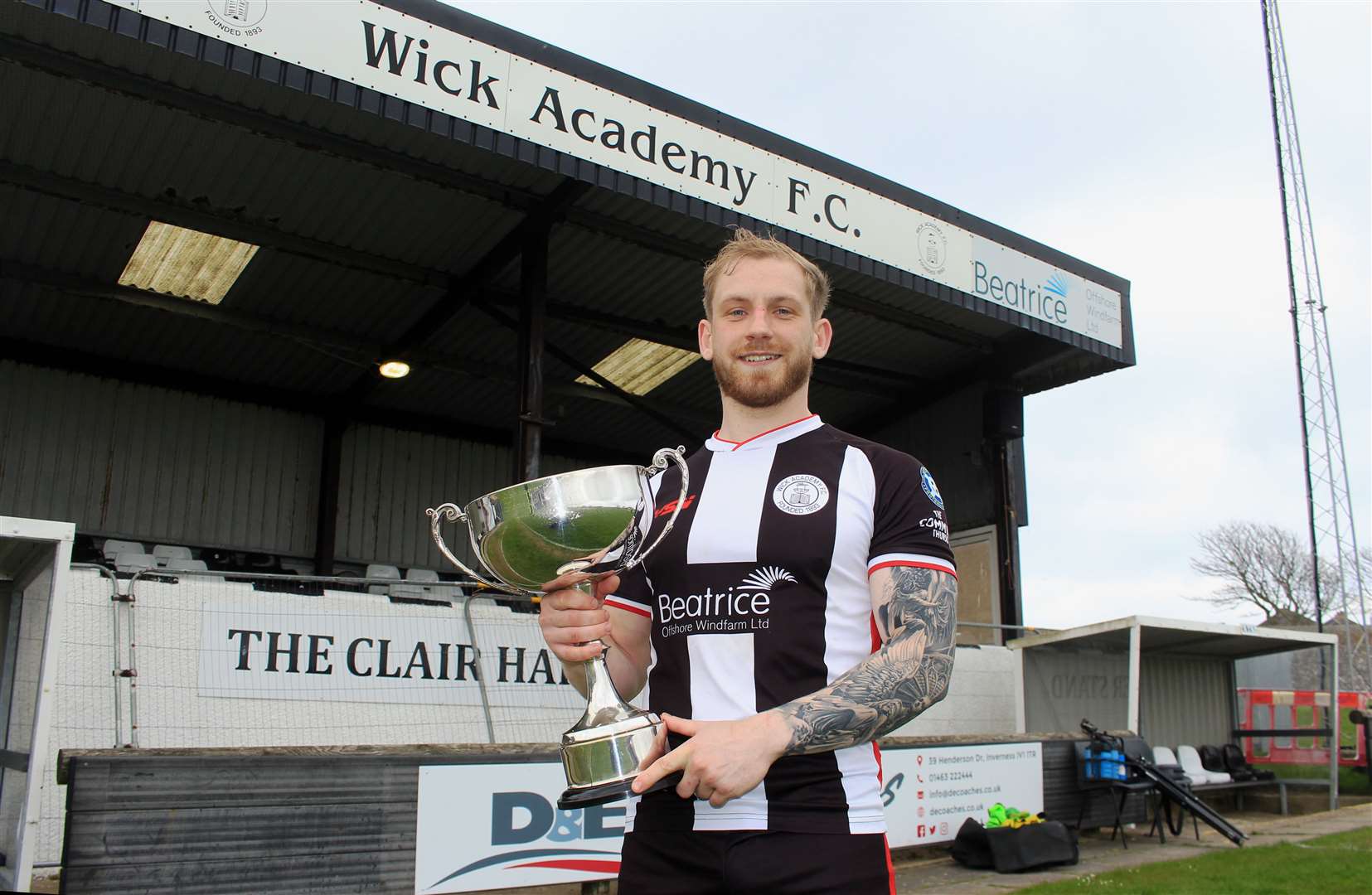 Alan Hughes with the George Munro Memorial Cup for supporters' player of the year. Picture: Alan Hendry