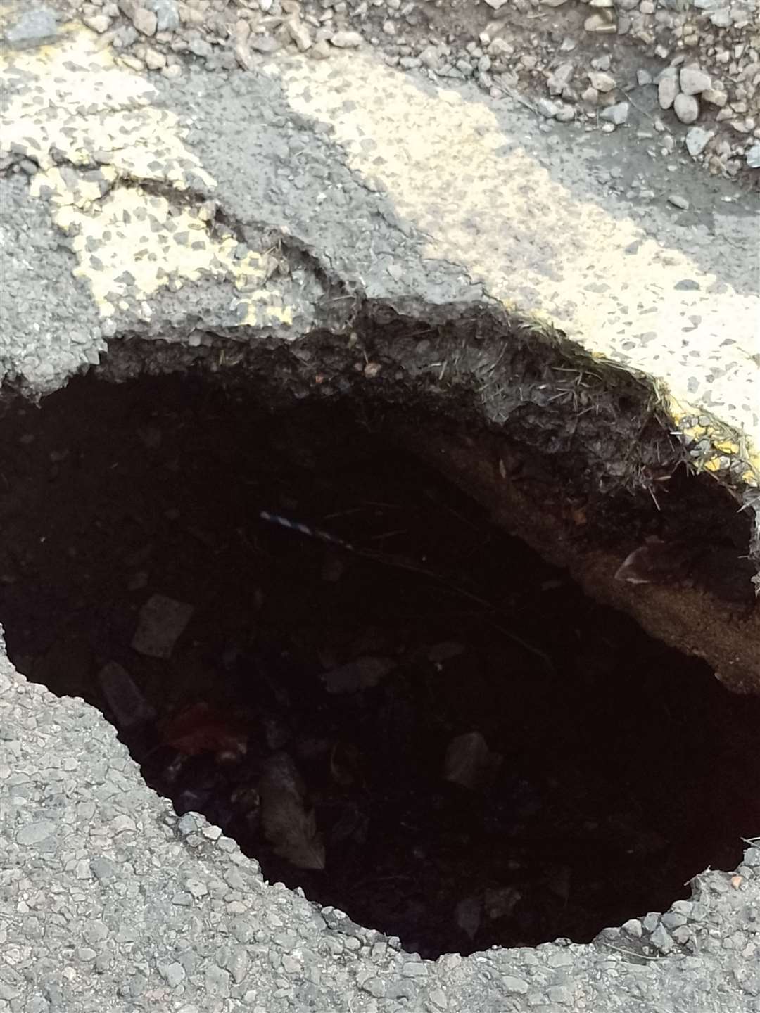The deep hole that has emerged in Thurso's Sir Archibald Road. Picture: Caithness Roads Recovery