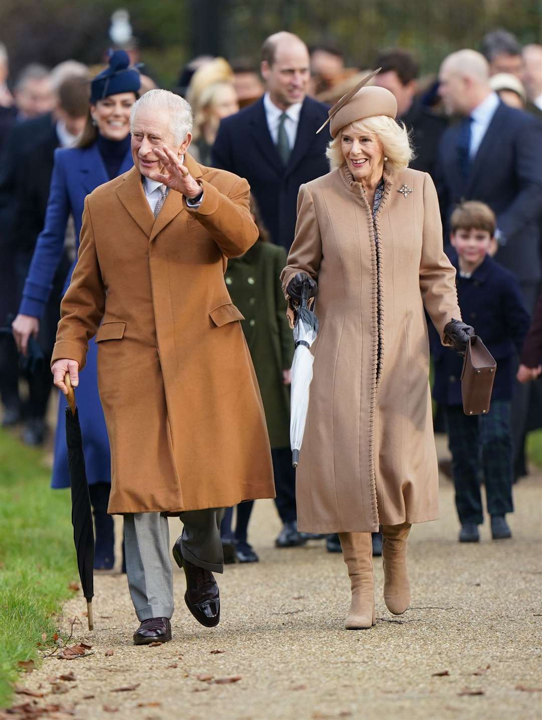 Royal watchers turned out to see the King and Queen Camilla attending the Christmas Day church service at St Mary Magdalene Church in Sandringham (Joe Giddens/PA)