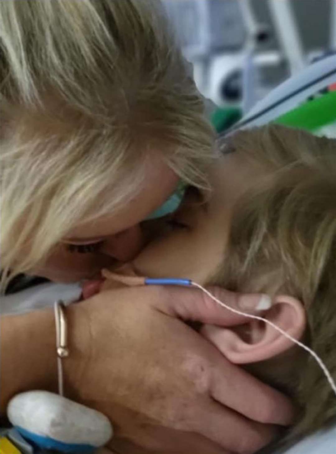 Hollie Dance with her son Archie Battersbee in hospital (Family handout/PA)