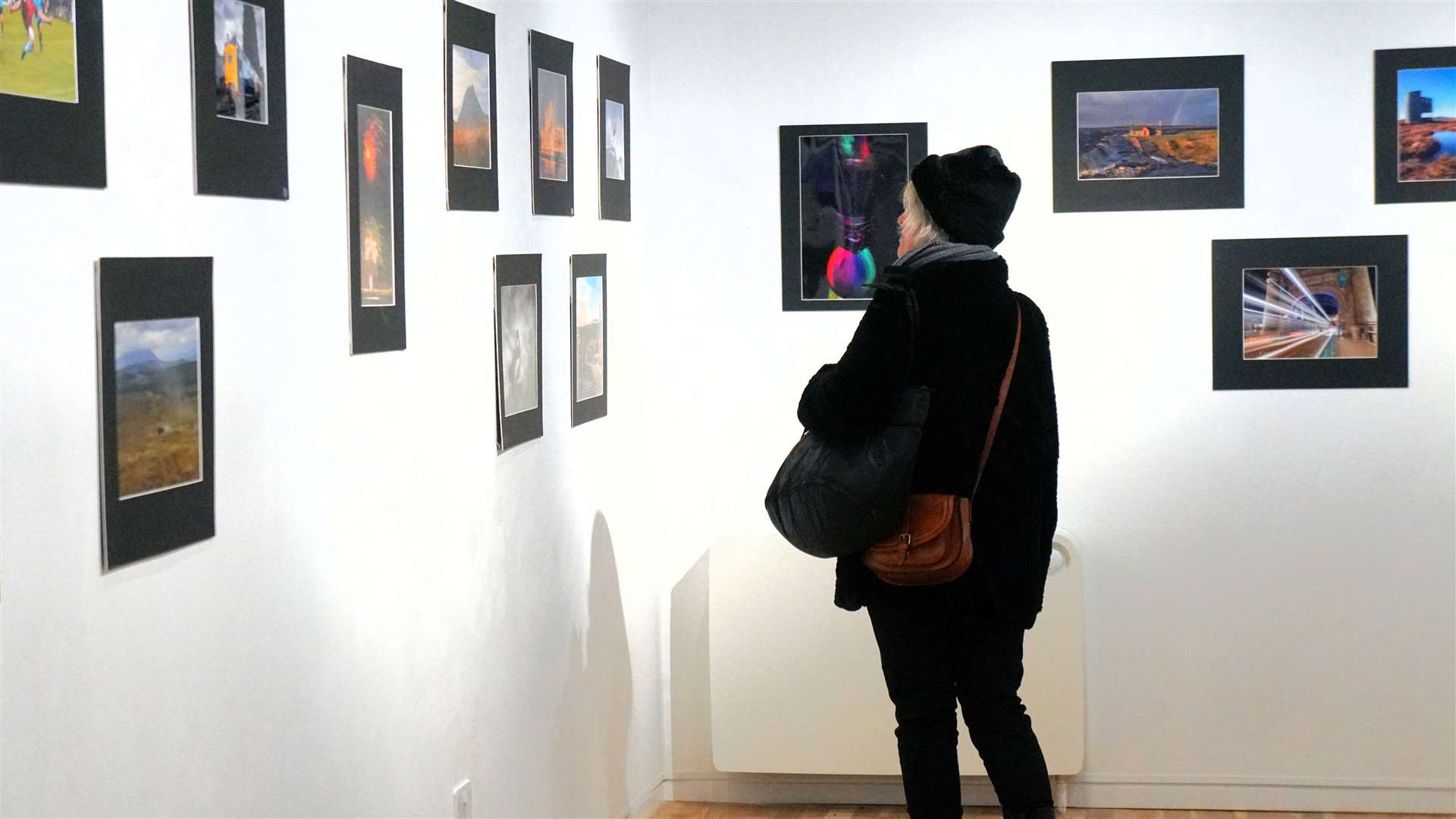 A visitor looks around the exhibition on the opening night. Picture: DGS