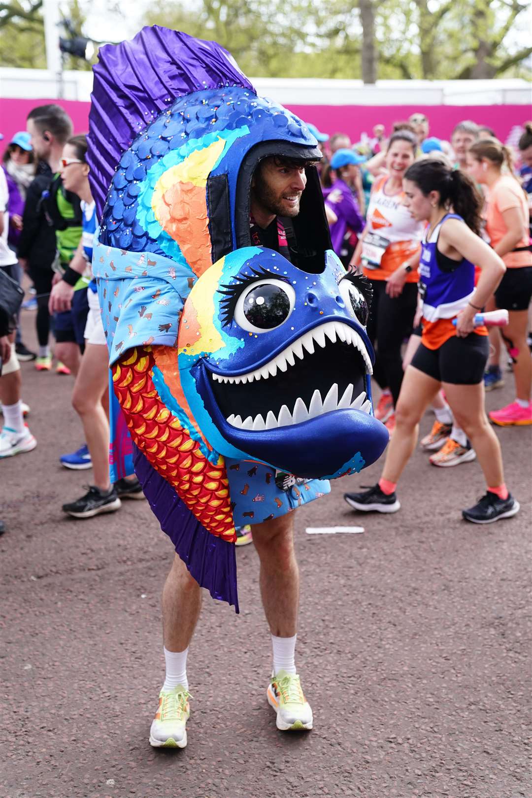 Many participants race in fancy dress, hoping their quirky costumes may boost their fundraising efforts (John Walton/PA)
