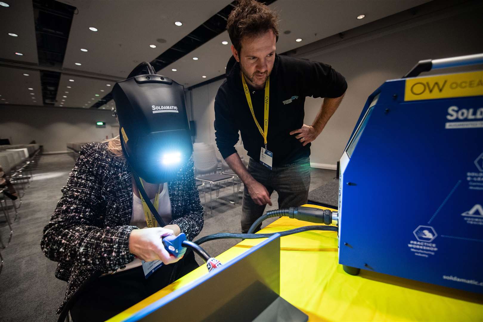 Claire Mack, chief executive of Scottish Renewables, tries her hand at augmented reality welding during Scottish Renewables' Offshore Wind Conference in Glasgow.