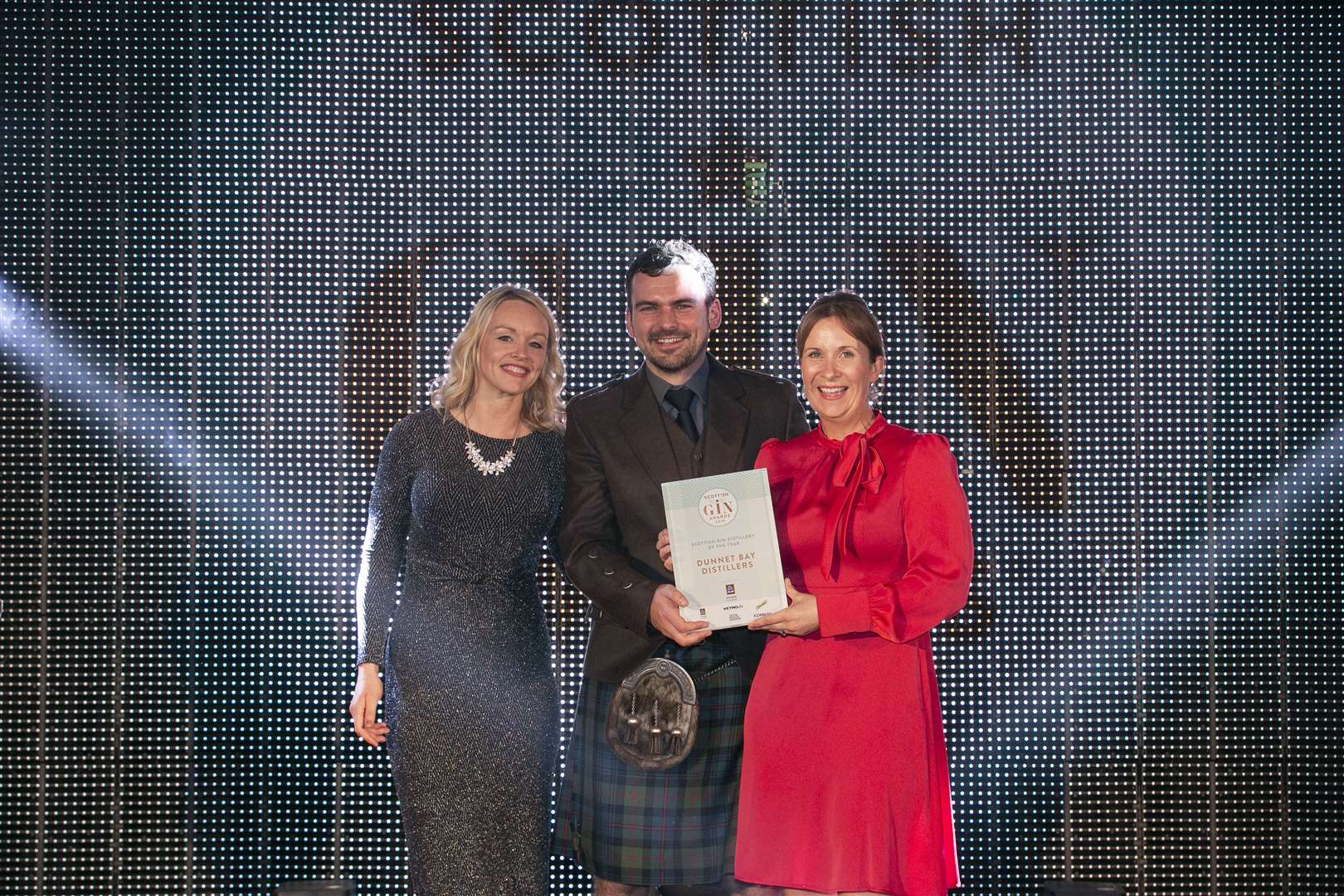 Martin and Claire Murray with the Scottish Gin Distillery of the Year award, which was presented by Christie Clinton of Aldi.