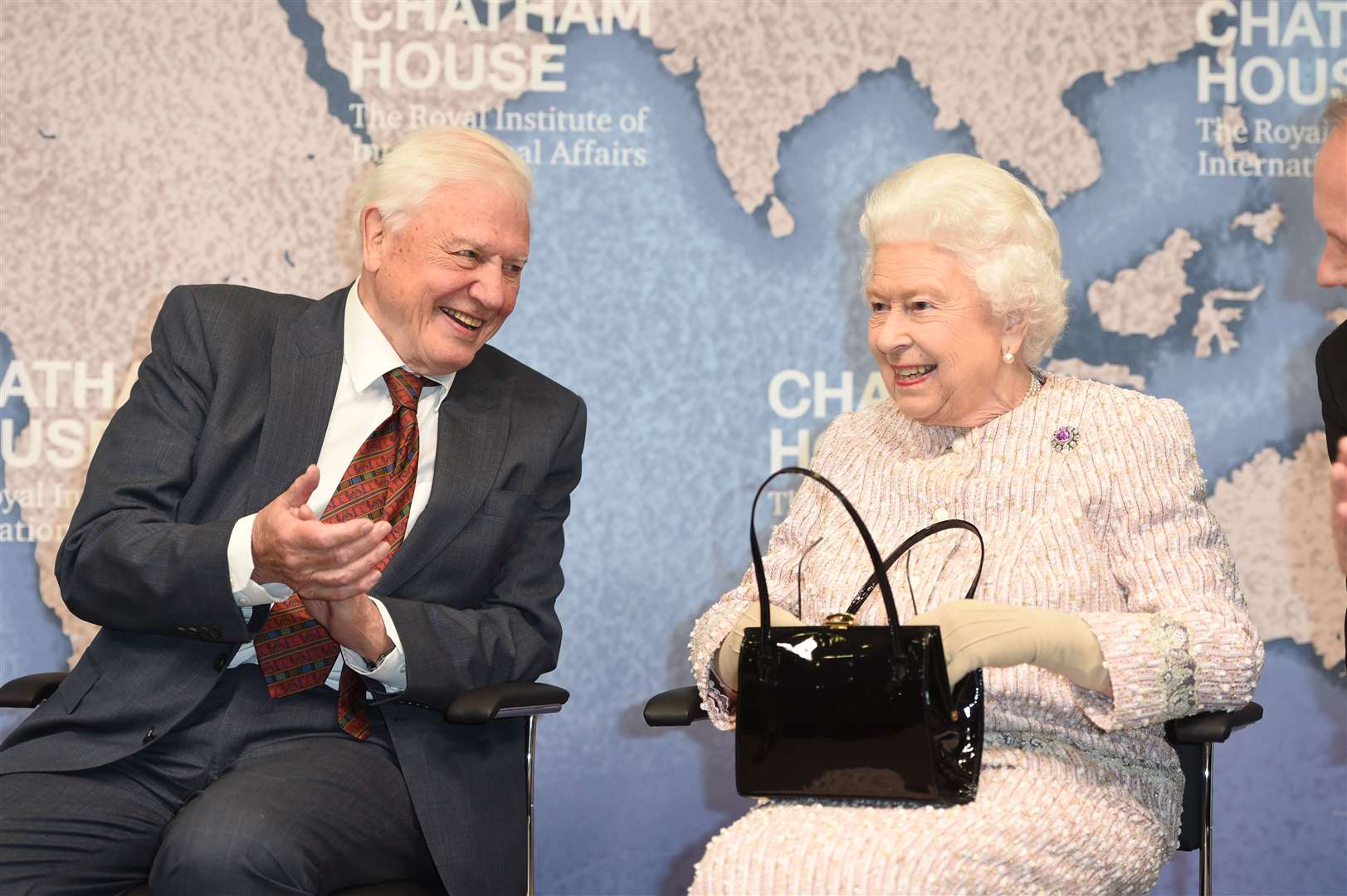 Queen Elizabeth II with Sir David Attenborough at the Royal institute of International Affairs in 2019 (Eddie Mulholland/The Daily Telegraph/PA)