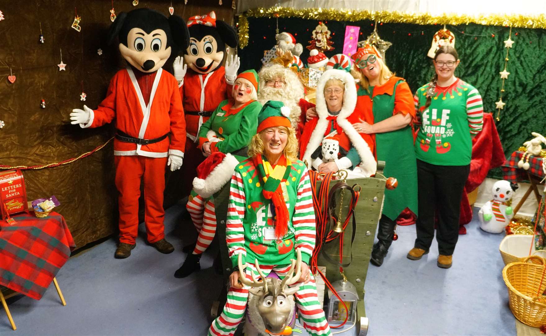 Staff at Highland Hospice bringing good cheer to their customers in Santa's grotto. Picture: DGS