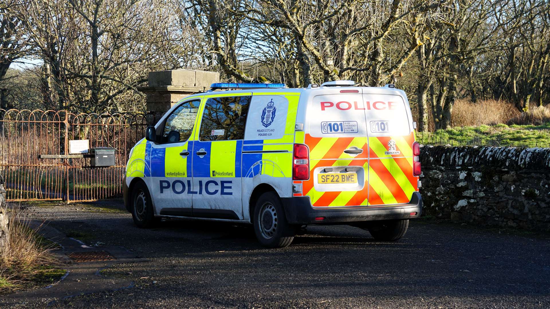 Another police vehicle is stationed at the entrance to Hempriggs House close to the site of the main investigation. Picture: DGS