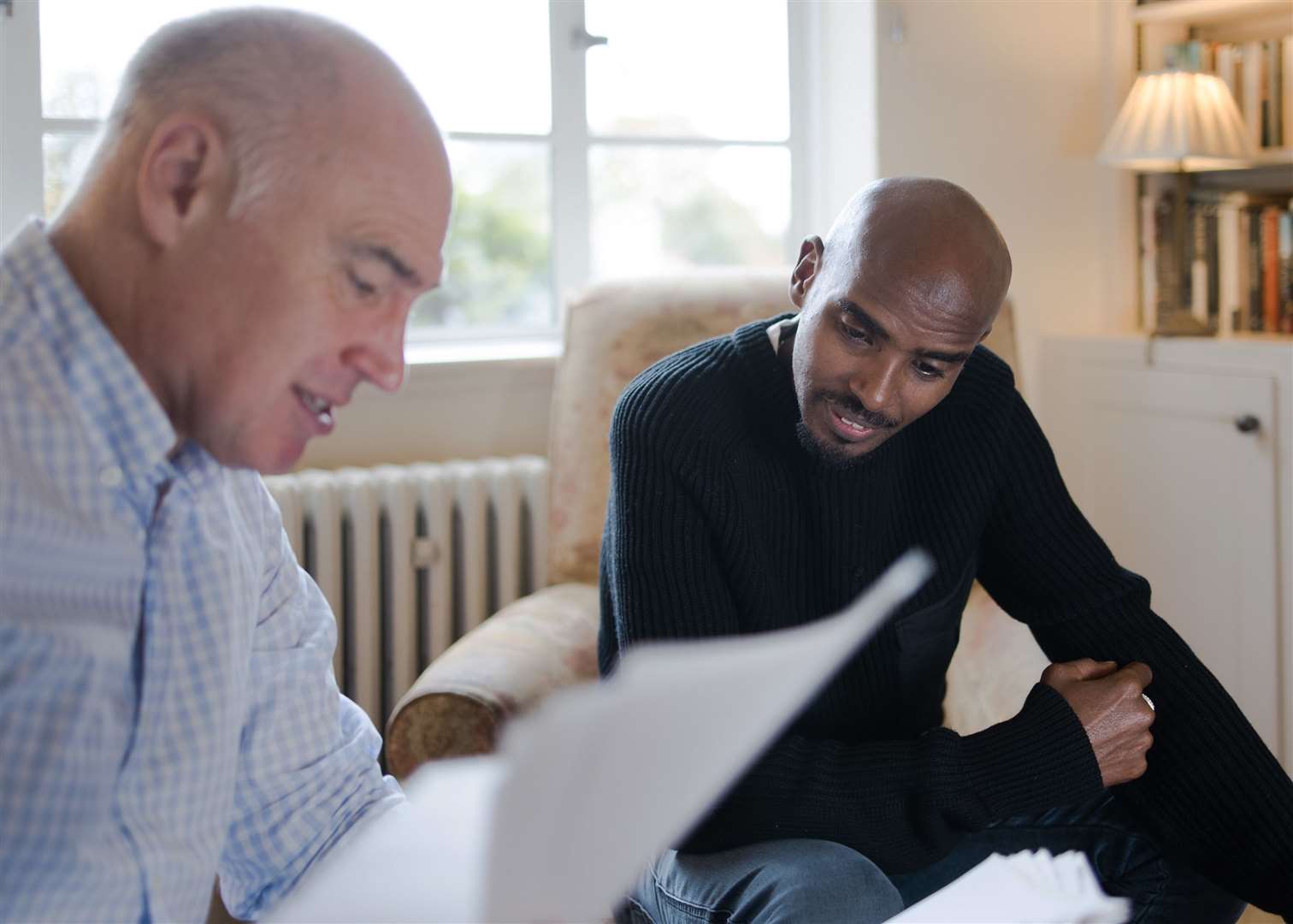 Sir Mo Farah with Alan Watkinson during the filming of the BBC documentary, The Real Mo Farah (Andy Boag/BBC/PA)