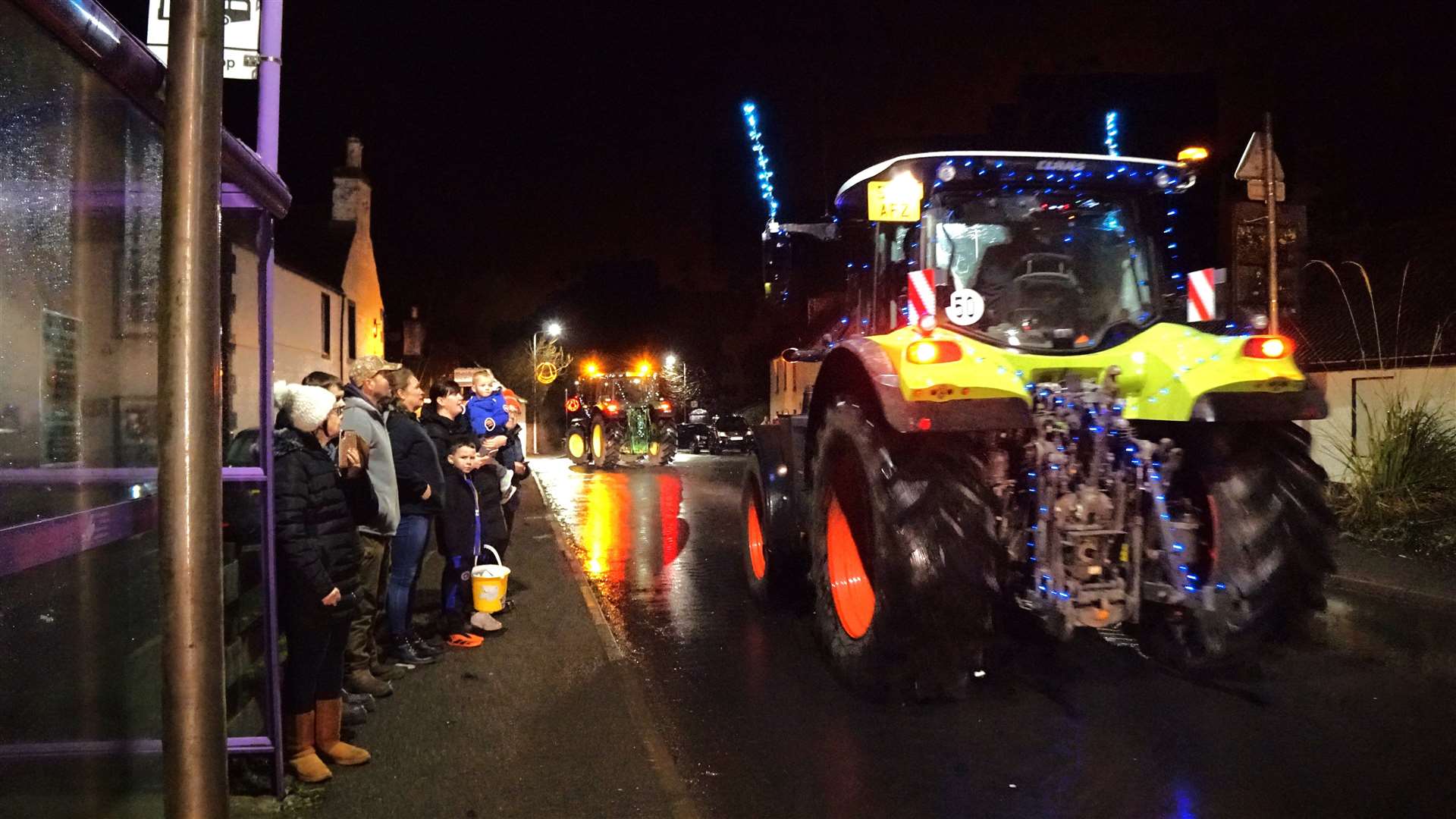 Many took to the main road through Watten to watch the parade. Picture: DGS