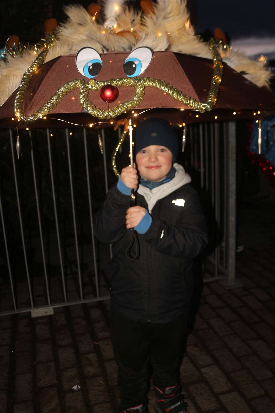Aiden McLeod with his reindeer umbrella. Picture: Eswyl Fell