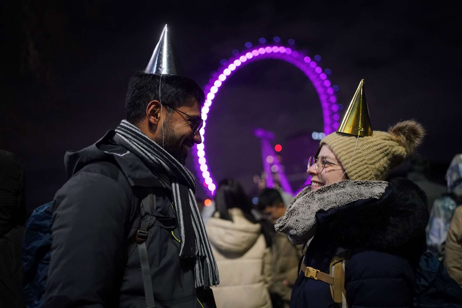 Revellers in central London ahead of midnight (Victoria Jones/PA)