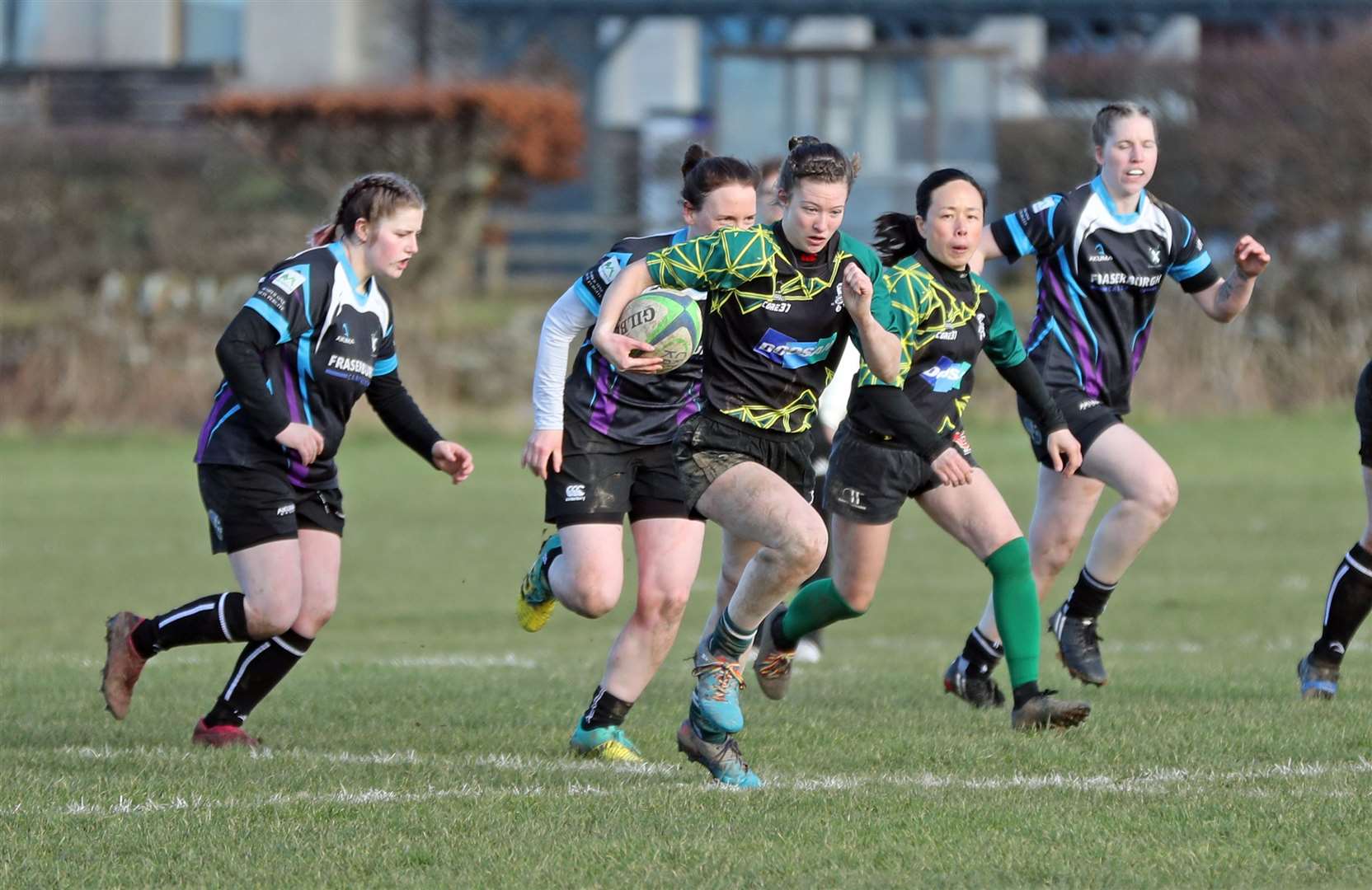Caitlin Harvey breaks clear to score a try for the Krakens in their thumping victory over Fraserburgh in the Scottish Women's Bowl. Picture: James Gunn
