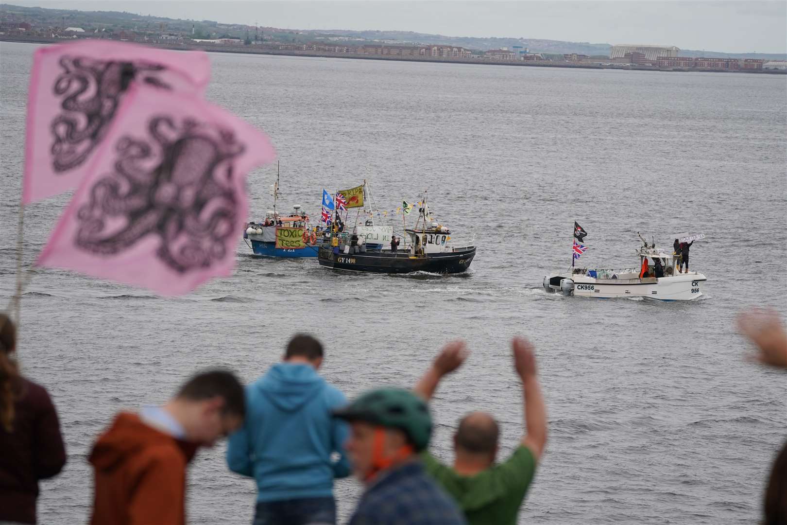 Fishing crews stage a protest in Teesport, Middlesbrough, near the mouth of the River Tees, demanding a new investigation into the mass deaths of crabs and lobsters in the area (Owen Humphreys/PA)