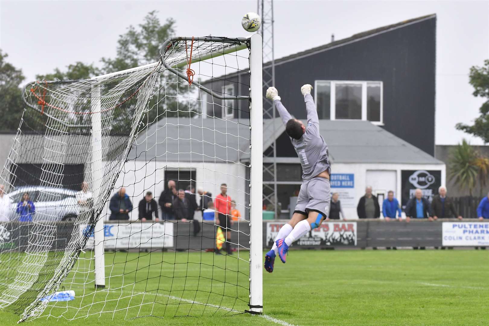 Wick Academy keeper Graeme Williamson at full stretch to tip the ball over the bar during Saturday's win against Turriff United. Picture: Mel Roger