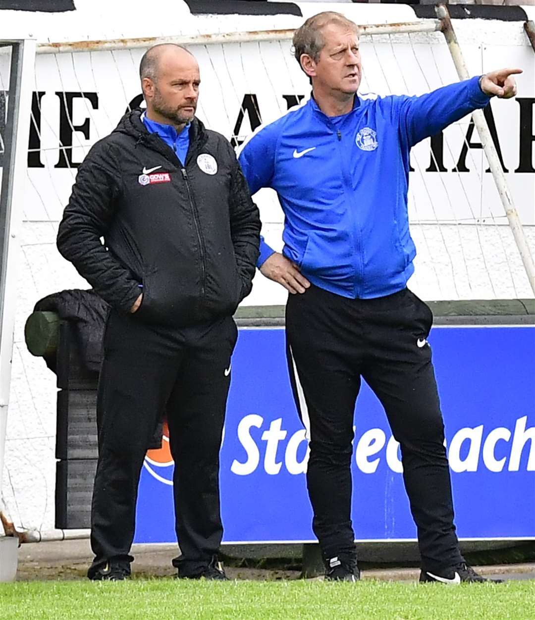 Wick Academy manager Tom McKenna (left) and assistant Richard Hughes look on during a loss to Deveronvale last season. They meet Vale again on Saturday and will be hoping for a better result. Picture: Mel Roger