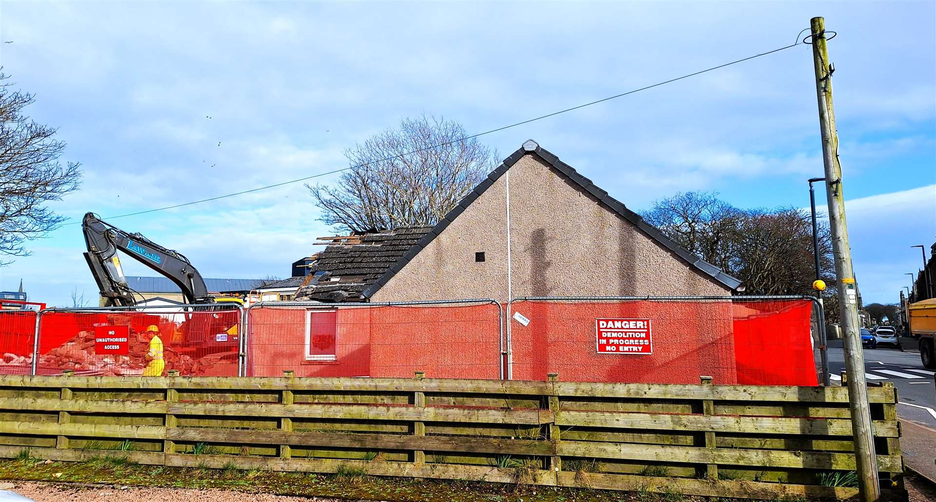 Bankhead Cottage in Wick is currently being demolished to make way for vehicles carrying wind turbine components as they attempt to navigate the corner at Thurso Road. Picture: DGS