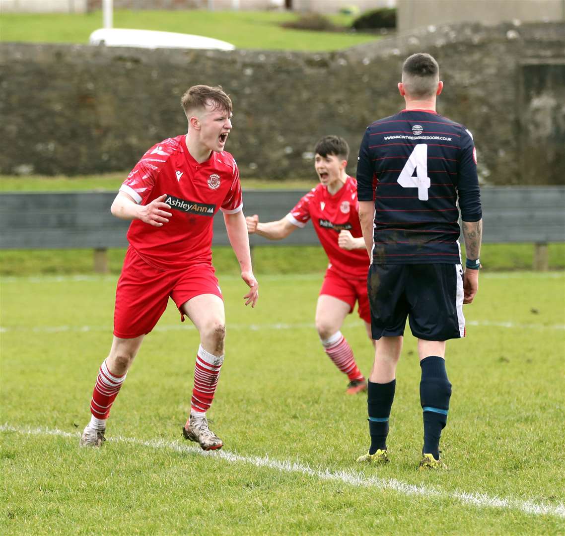 Lewis Mackillop turns to celebrate after scoring the winner for Thurso. Picture: James Gunn