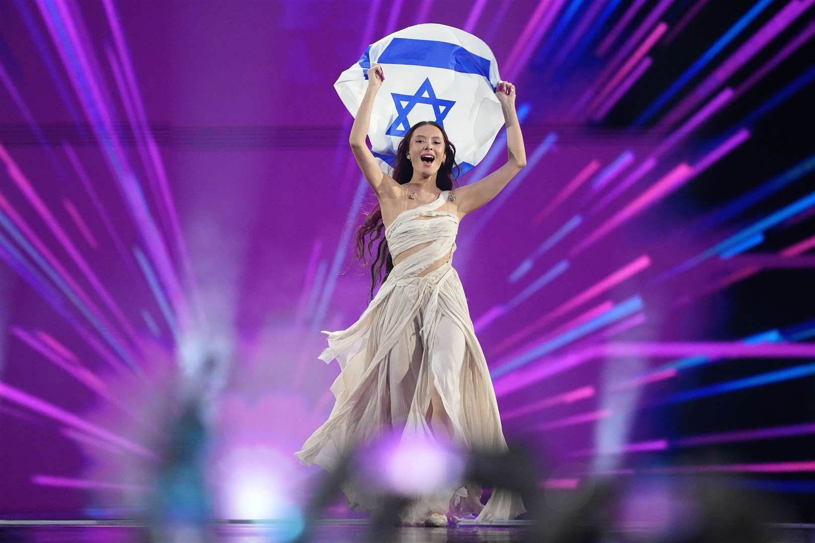 Eden Golan of Israel enters the arena during the flag parade before the grand final of the Eurovision Song Contest in Malmo (Martin Meissner/PA)