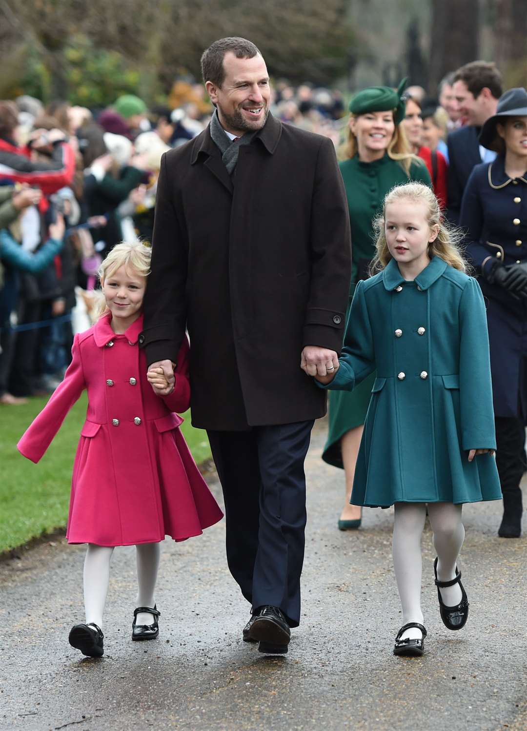 Peter Phillips with his daughters Isla (left) and Savannah (Joe Giddens/PA)