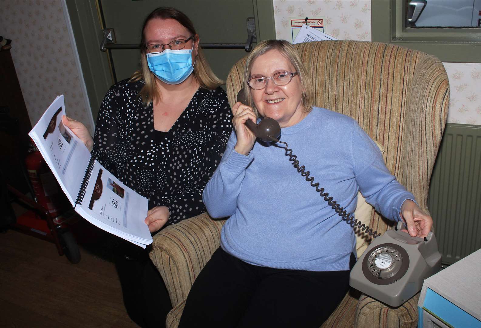 Laurandy Centre user Mary Inkster listens to the phone while manager Tracy Mackay holds the directory. Picture: Alan Hendry