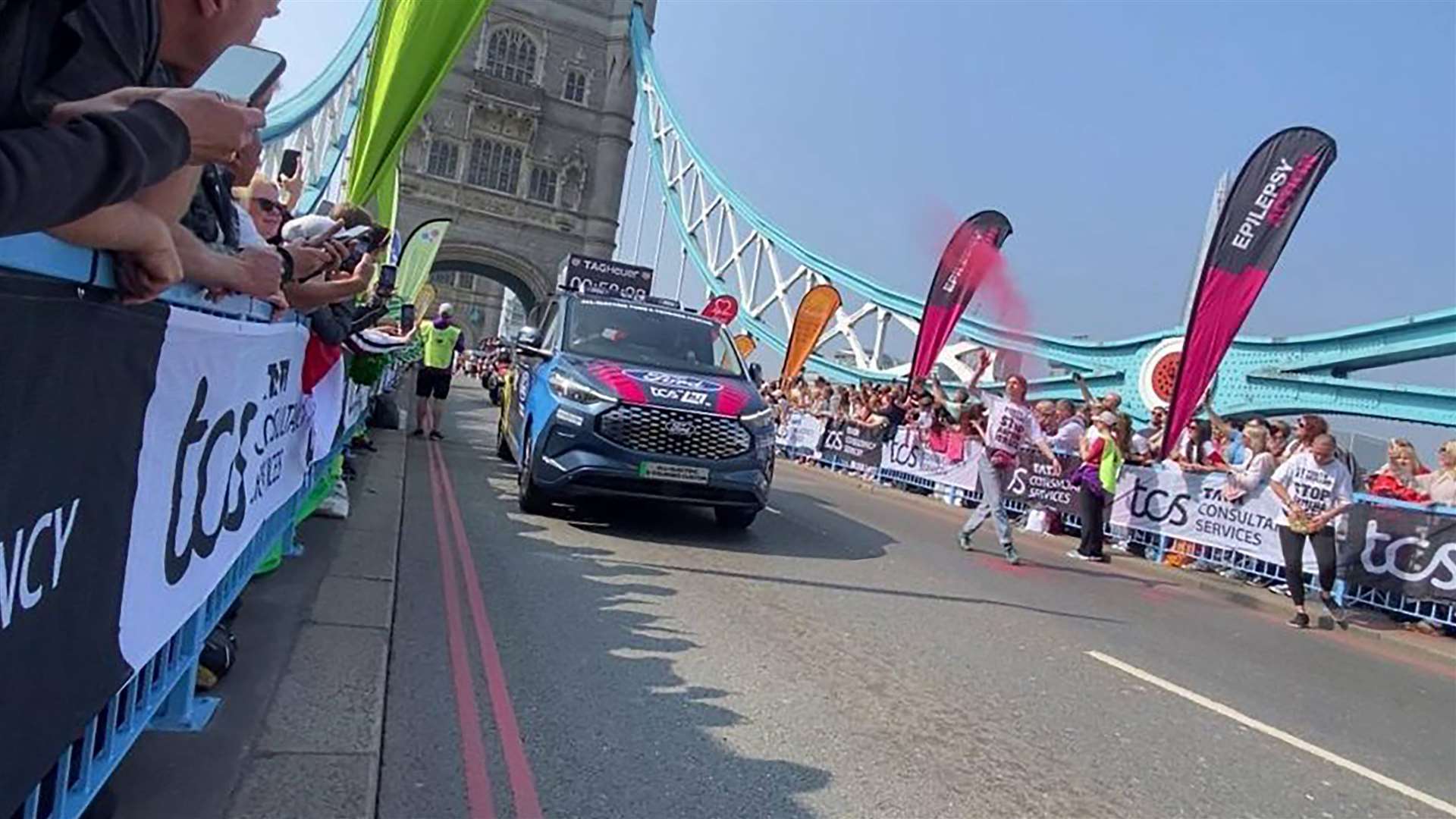 Handout photo issued by Youth Demand of their protest during the TCS London Marathon on Tower Bridge, London (Youth Demand/PA)