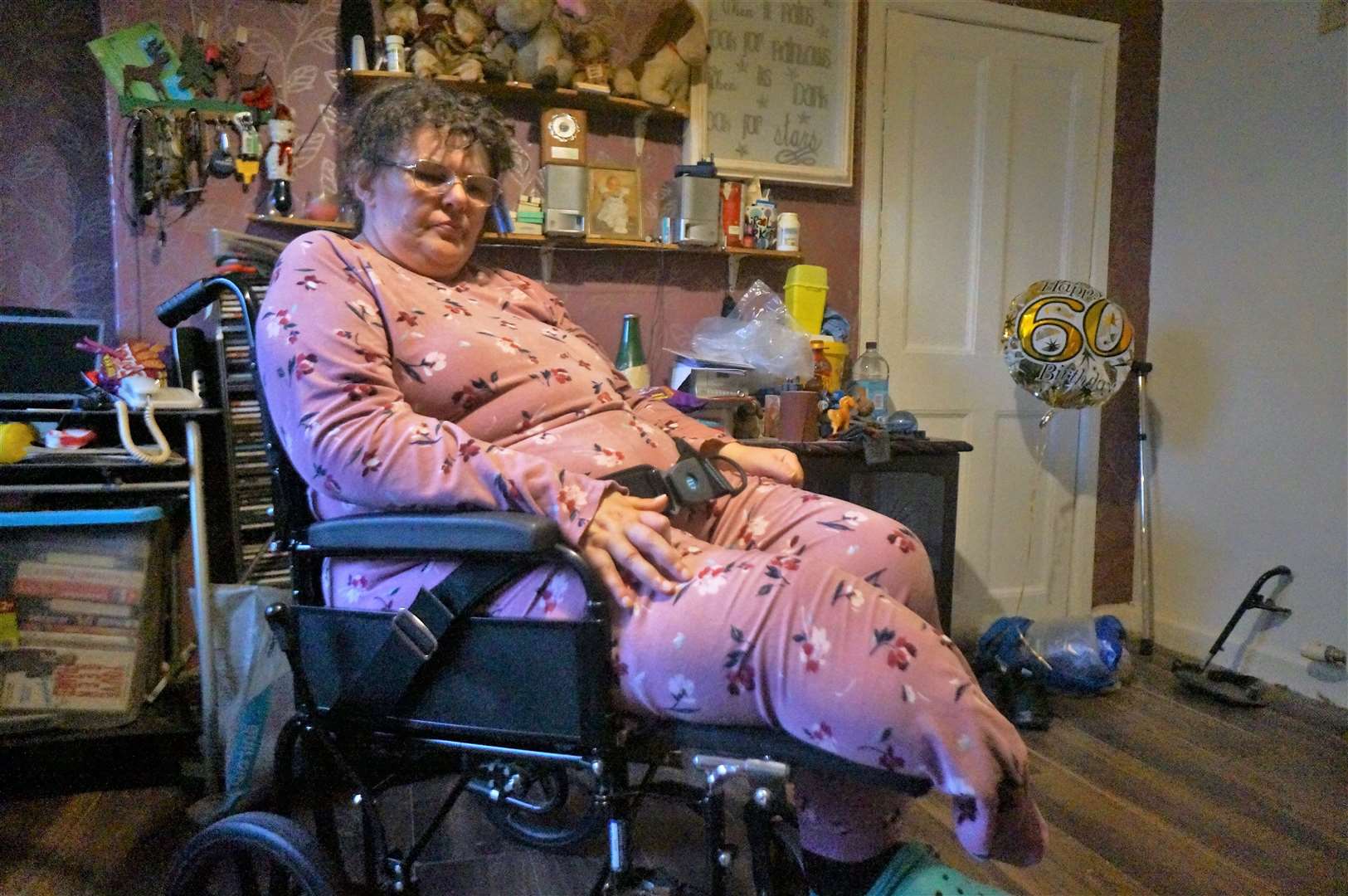 Janet says she has to sleep in her wheelchair through the whole night as the pain is worse when she lies down. Picture: DGS