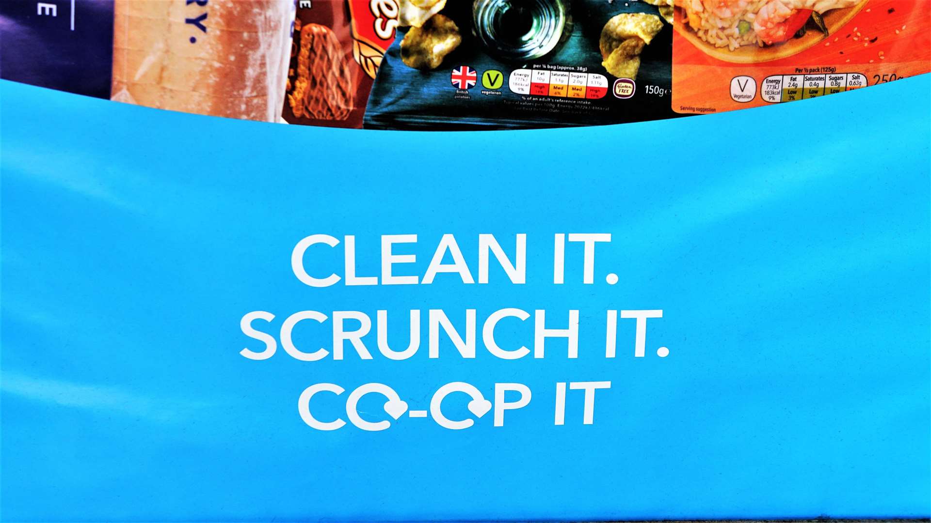 A new campaign placard urging shoppers to recycle at the store.