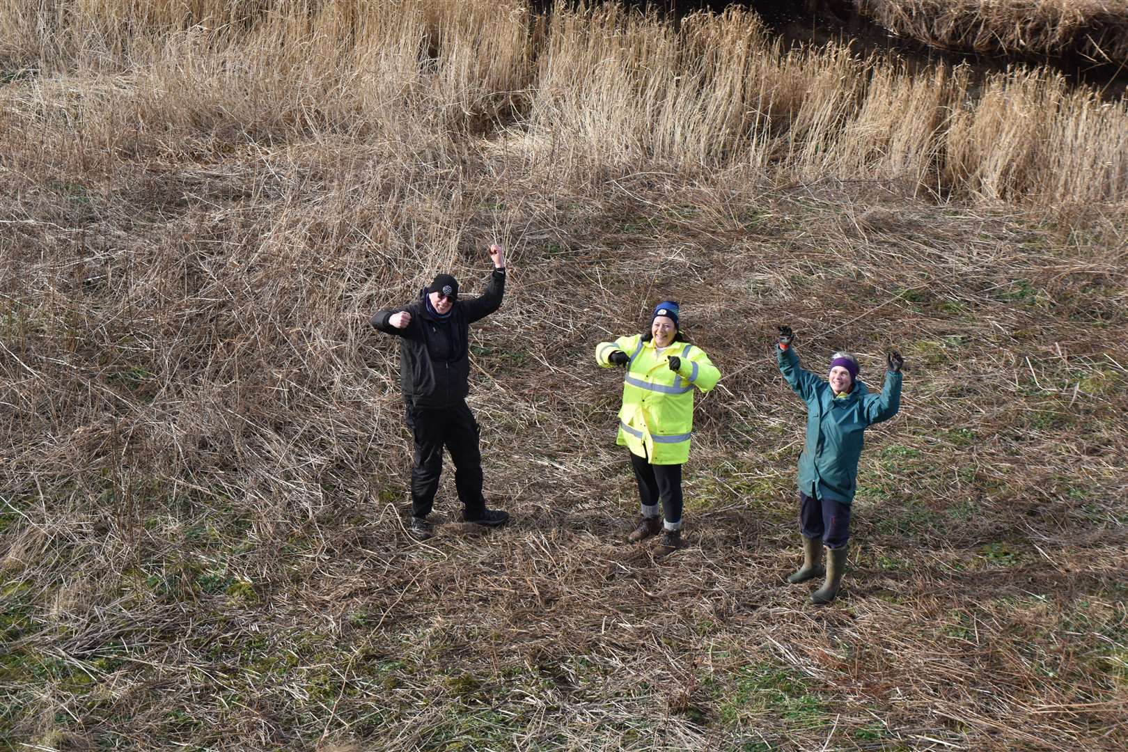 The volunteers celebrate after the creels were removed. Pictures: Dorcas Sinclair
