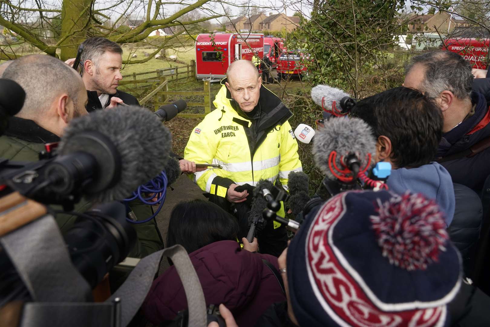 Peter Faulding (centre) of private underwater search and recovery company Specialist Group International (SGI), speaks to the media (Danny Lawson/PA)