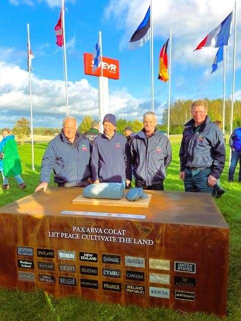 James is second from right and is pictured with a rock from Caithness Norstone that was added to a symbolic cairn at the Latvian event.