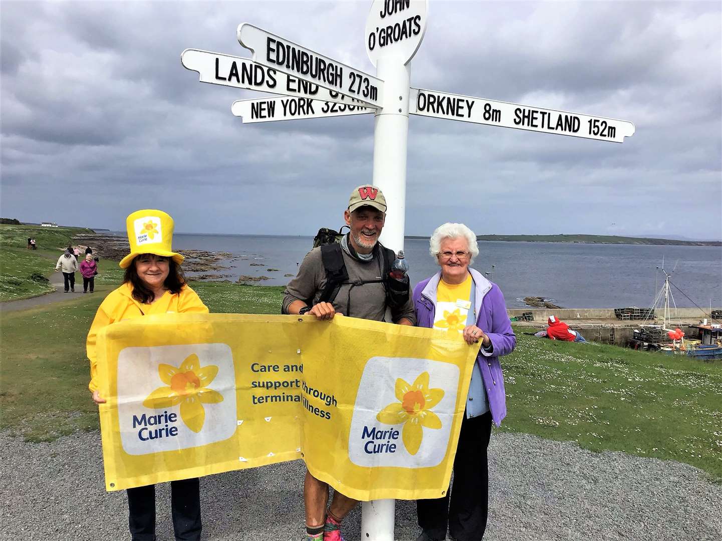 From left, Ann Sargent (chairperson of the Wick Marie Curie Care fundraising group), charity walker Mark Schofield and Lottie Shearer (committee member of the charity group). Picture: Barbara Nicol