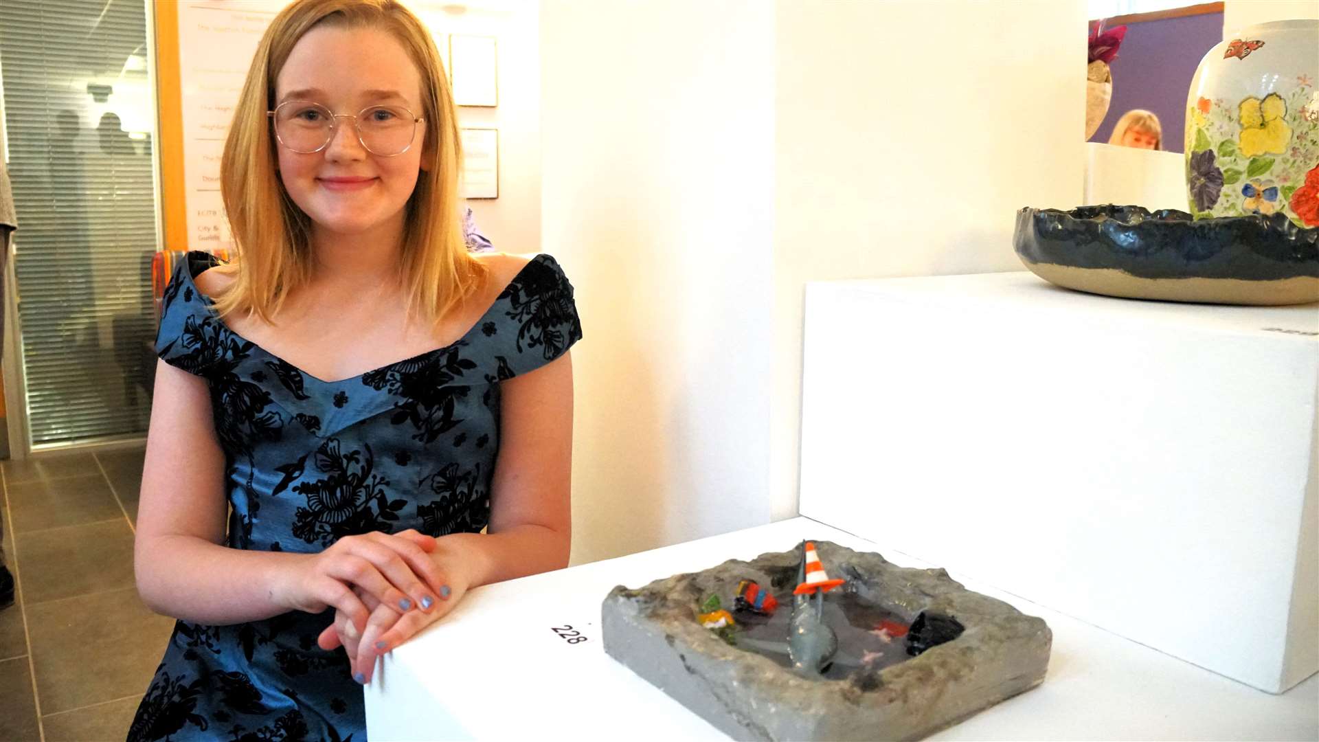 Twelve-year-old Martha Pott's with a surreal sculpture based on a Caithness pothole. Picture: DGS