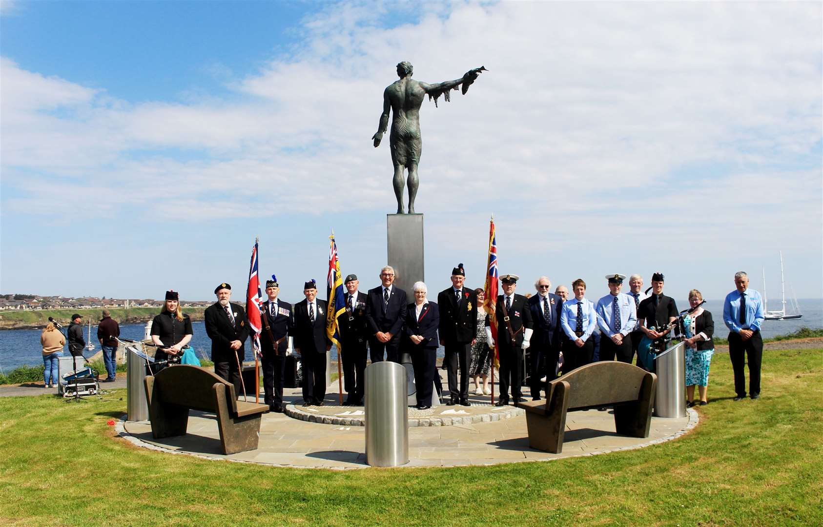 The main speakers and others who took part in the second National Fishing Remembrance Day commemoration at the Seafarers Memorial in Wick. Picture: Alan Hendry