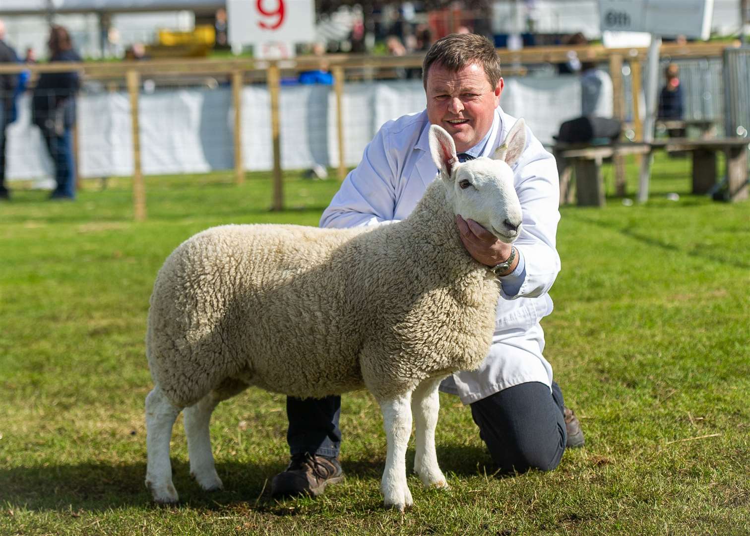 Andrew Polson with his prize-winning North Country Cheviot ewe lamb.
