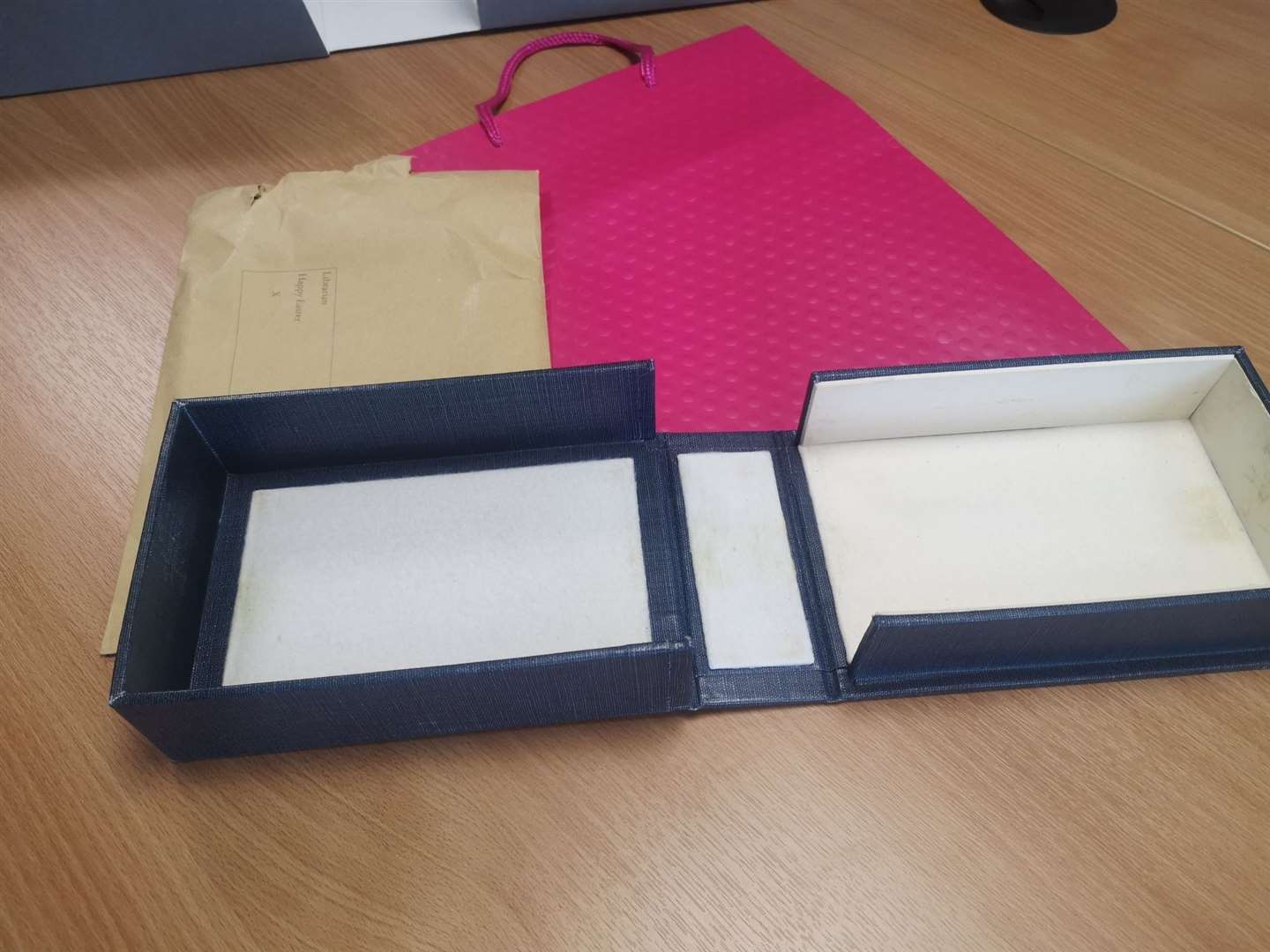 The pink gift bag that contained two Charles Darwin manuscripts that were anonymously returned to Cambridge University Library. (Cambridge University Library/ PA)