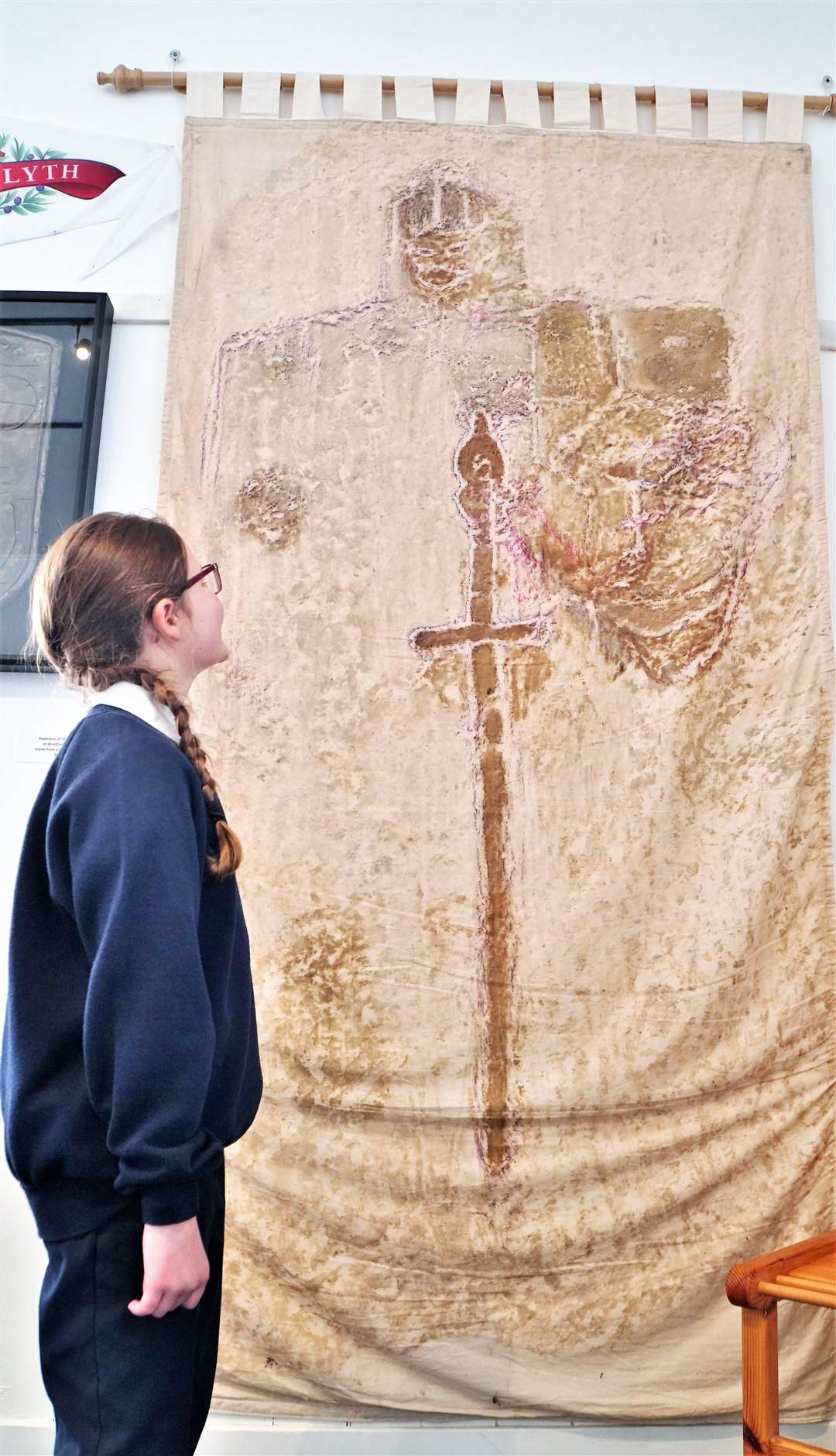 A pupil from Lybster Primary School looks at the towering figure of the Westford Knight at a special open day event in 2008. Picture: DGS