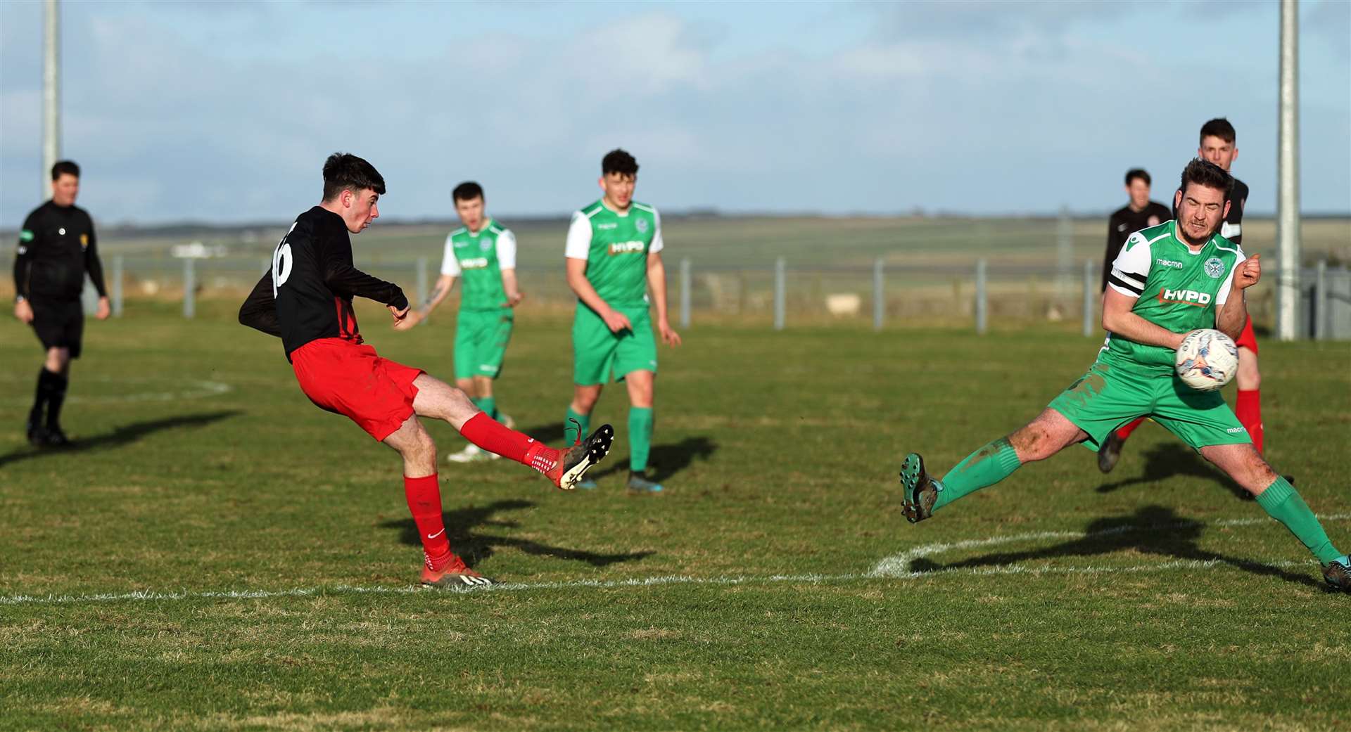 Kyle Henderson curls in a beauty as he adds the fourth of Halkirk United's goals in their 6-1 victory over Bonar Bridge. Picture: James Gunn