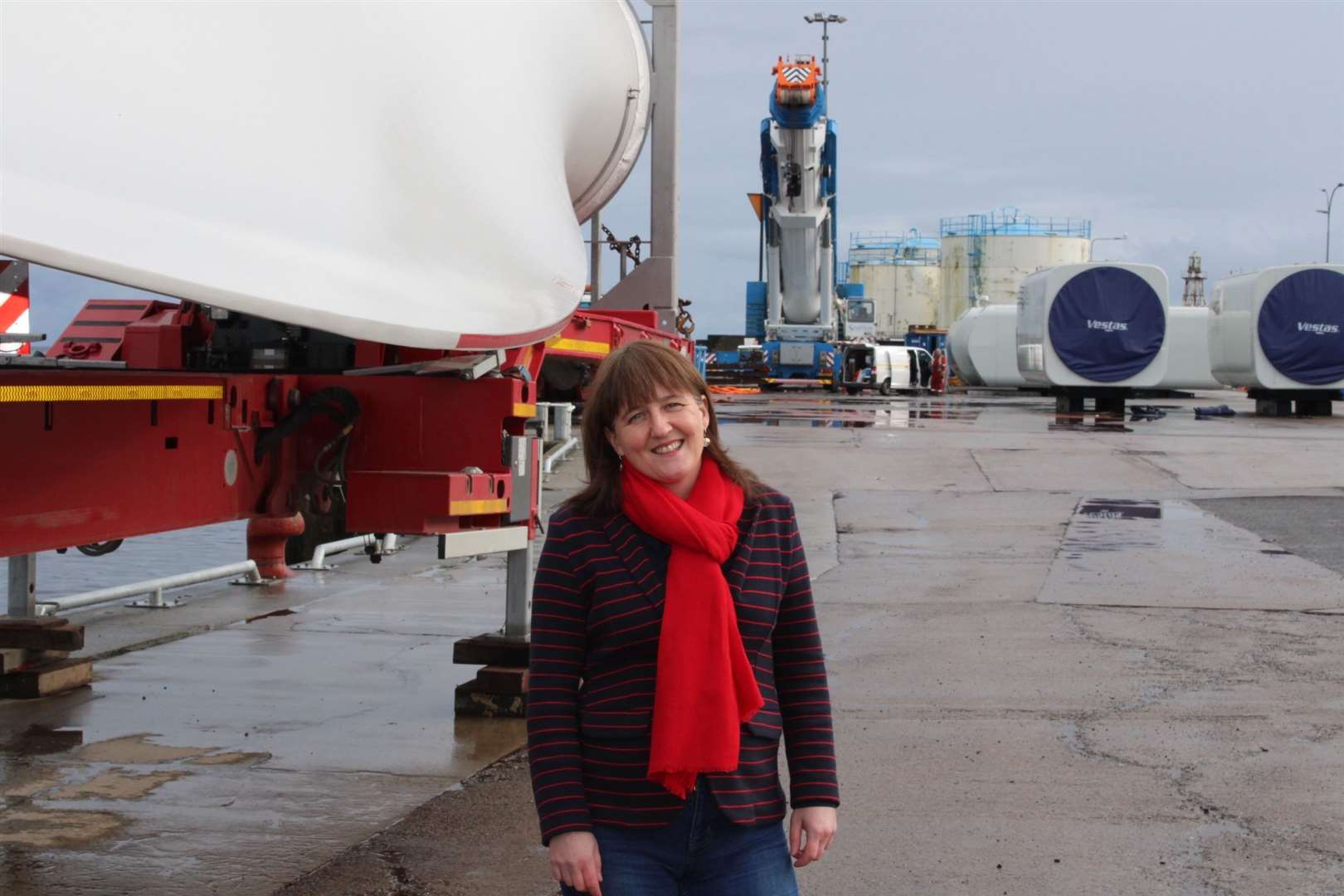 Maree Todd beside wind turbine parts delivered to Wick harbour. She says Scotland’s future energy supply must be based around renewables.